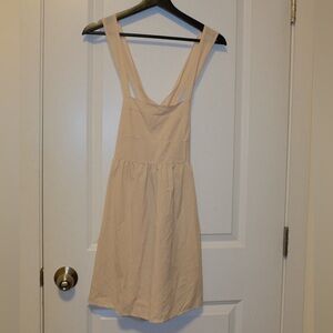 Elegant Cream cross back Dress